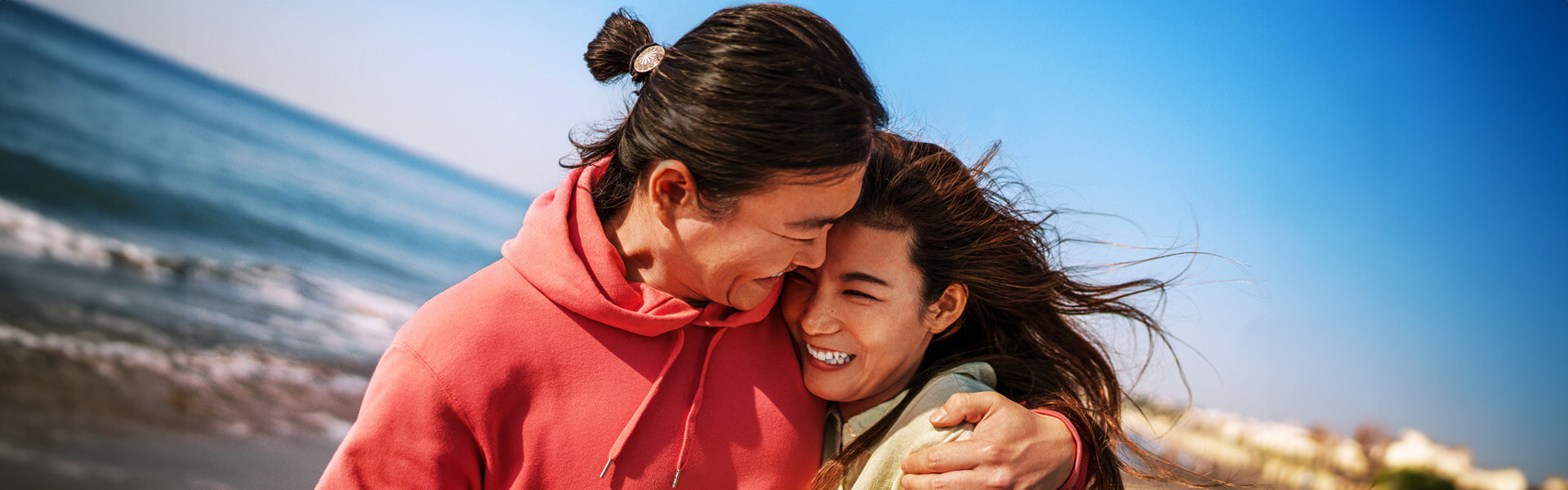 couple hugging on a beach