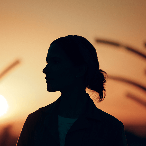 2	A silouette of a woman looking in the distance