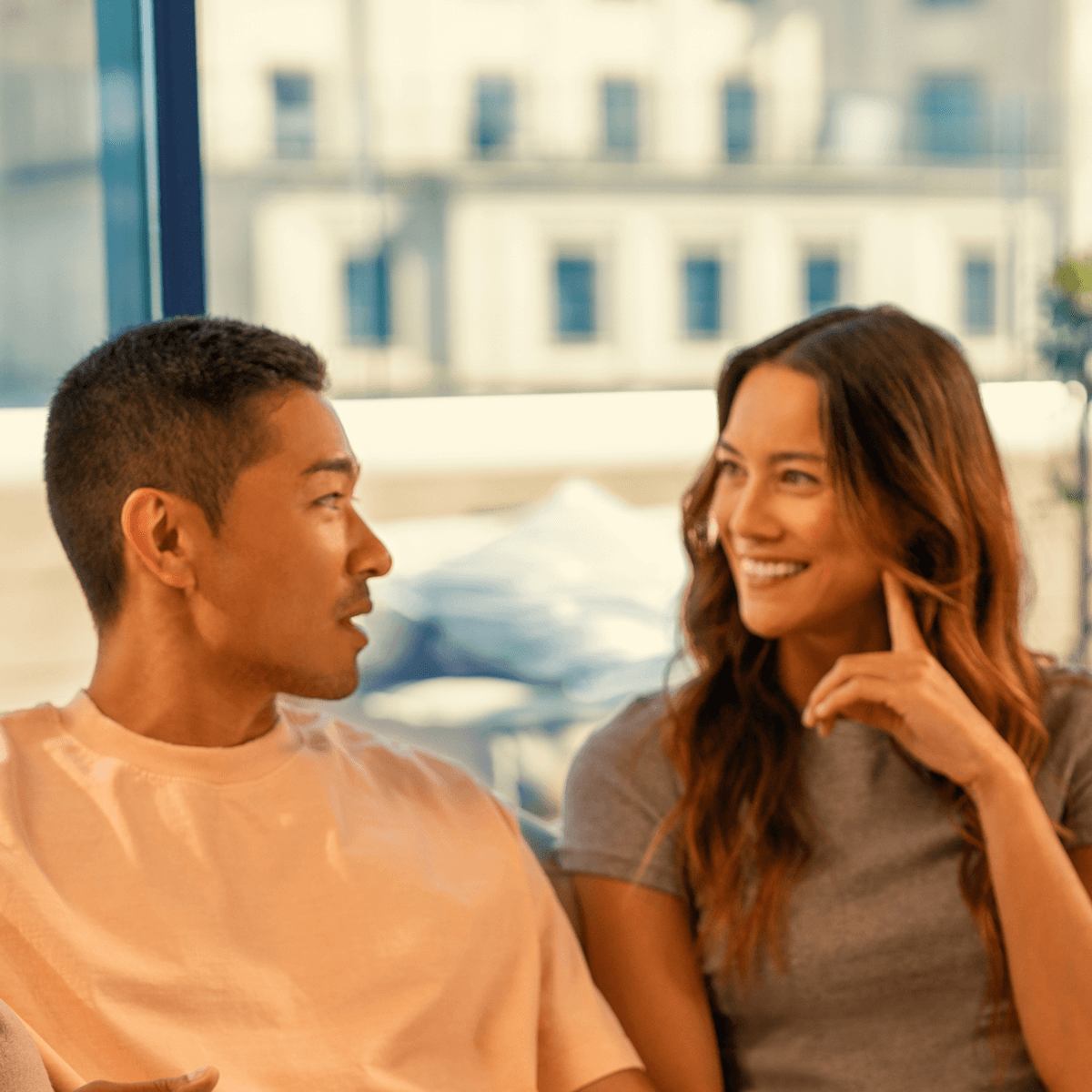 A man and woman talking