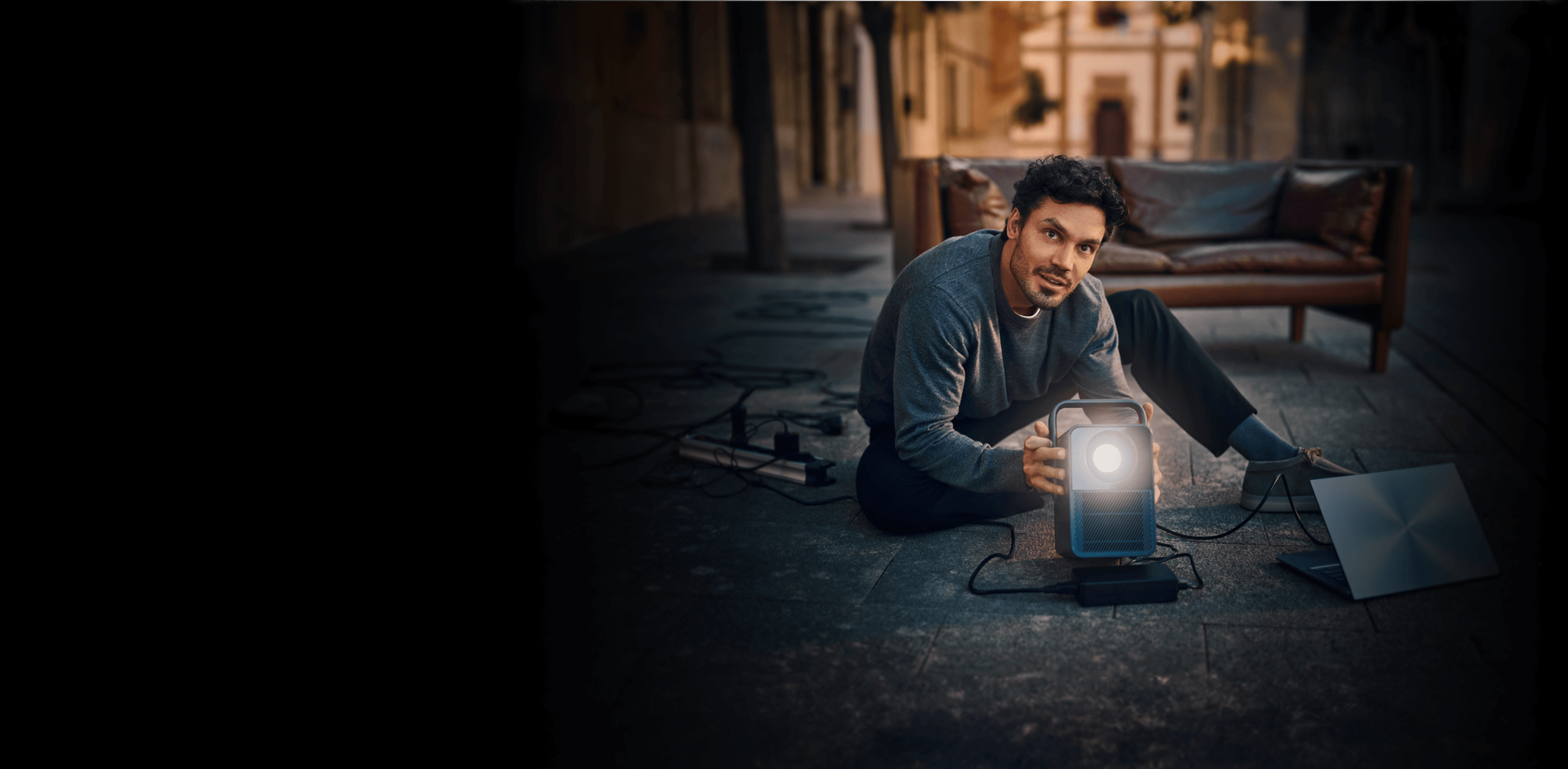 A man using a projector