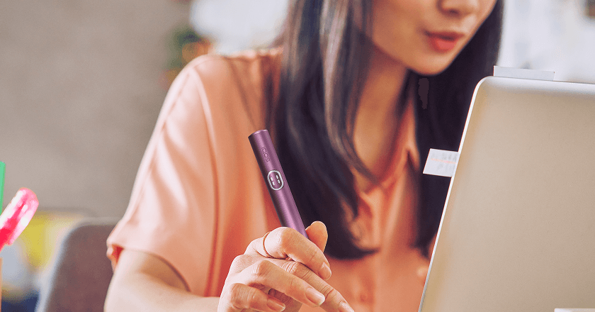 A woman working on her computer