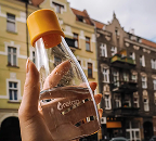 Bottle in a hand