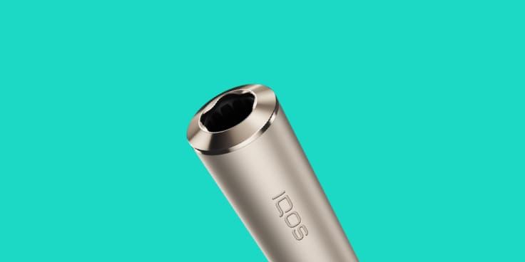 An IQOS ILUMA Holder with a TEREA tobacco stick inserted.